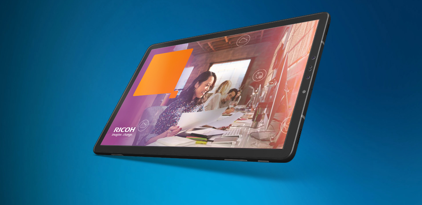 tablet showing woman in co-working space