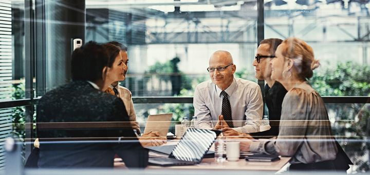 Ricoh Workplace Experience - people sitting around table