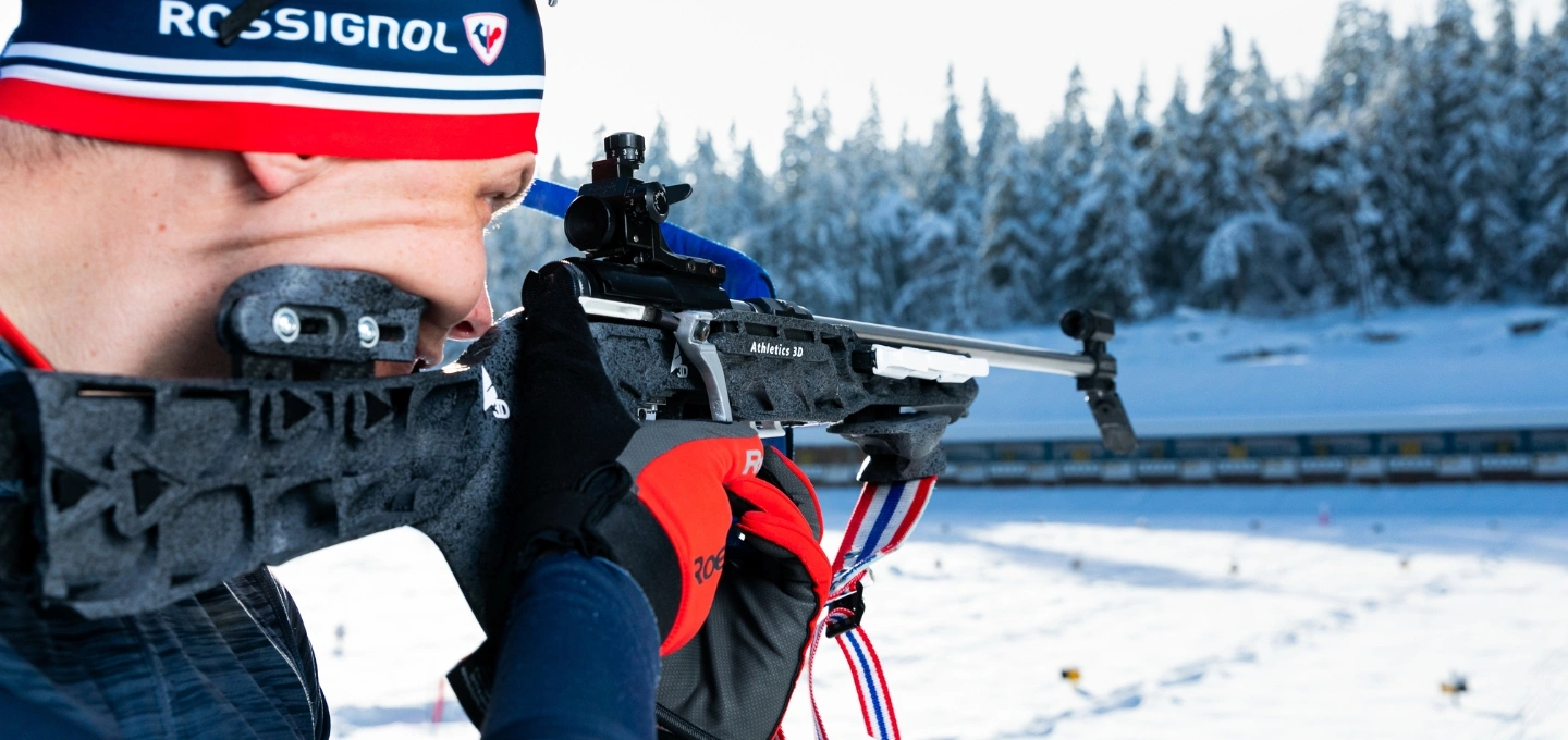An elite athlete competing in biathlon. 