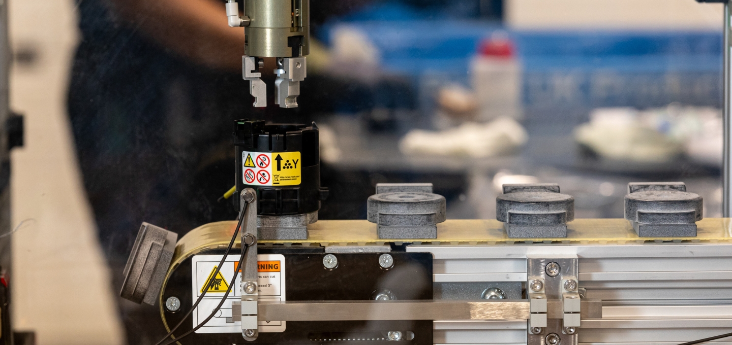 3D-printed components fixed on an industrial production line.